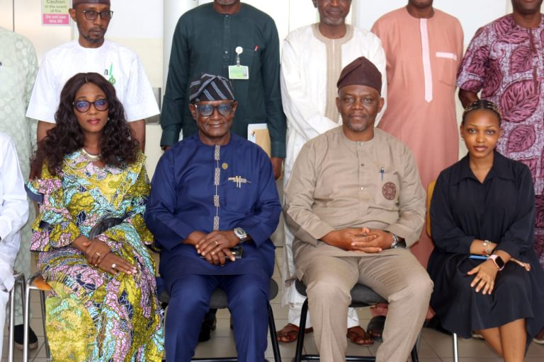 The Executive Secretary, FCDA, Engr. Richard Yunana Dauda ( second right); the retiree; his wife, Mrs Patience Gamde ( first left), and daughter, Fanmi Gamde.